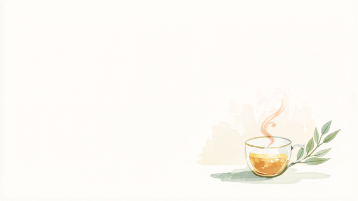 湯気の立つお茶と一枚の葉。ひと休みのイメージ
